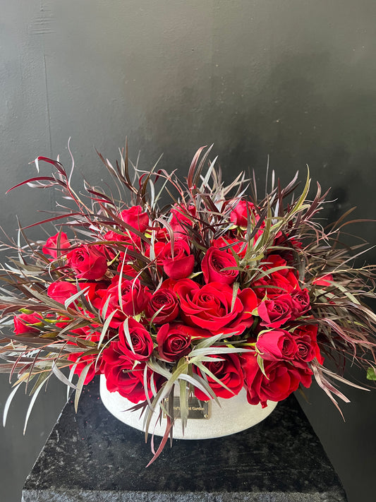 Red round roses with Agonis